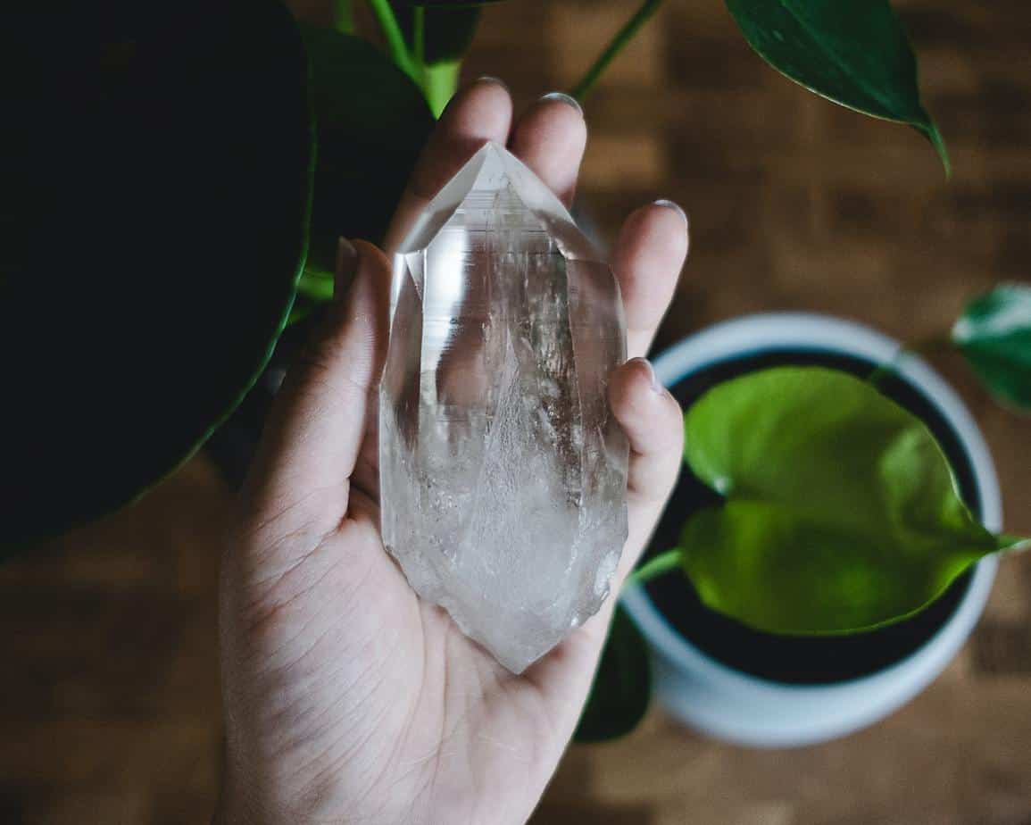 Crystal in a hand | Photo by Dani Costelo on Unsplash