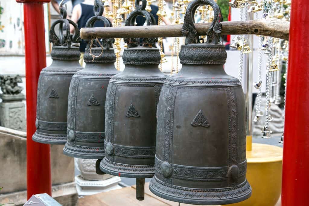 buddhist bell | Photo by Milada Vigerova on Unsplash